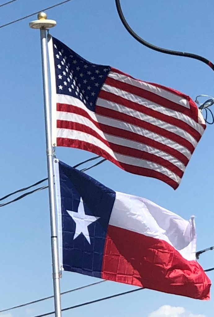 US and Texas Flags on Our Flagpole